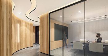 办公室设计装修：入口以浅灰色大理石和凹槽白蜡木优雅装饰